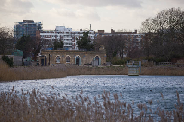 istock A cold English lake sits in front of old stonework 983298838