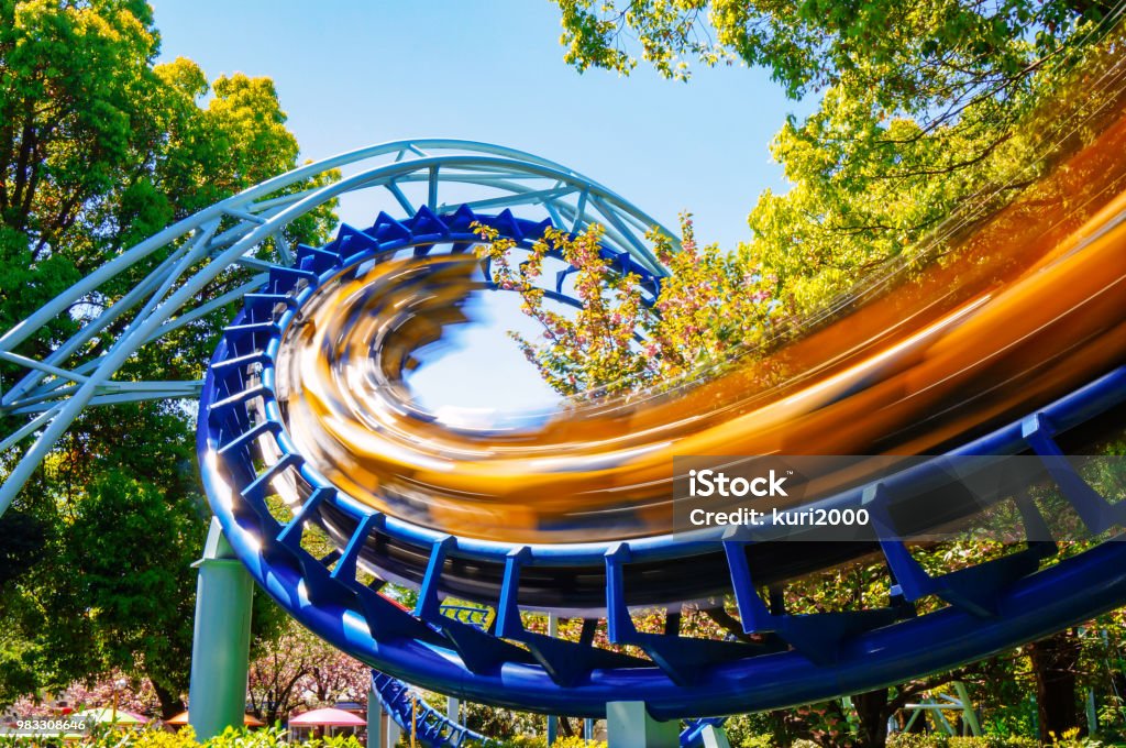 Rollercoaster at amusement park Rollercoaster Stock Photo