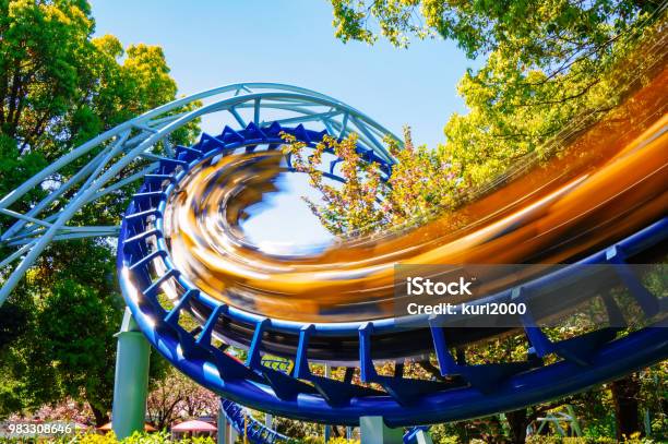 Rollercoaster At Amusement Park Stock Photo - Download Image Now - Rollercoaster, Amusement Park, Riding