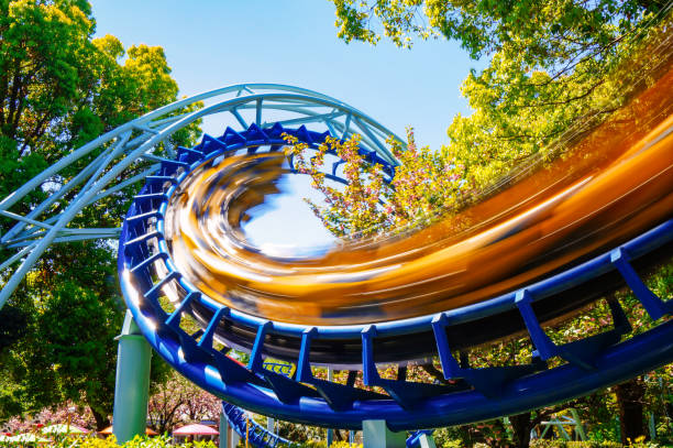rollercoaster at amusement park - amusement park imagens e fotografias de stock