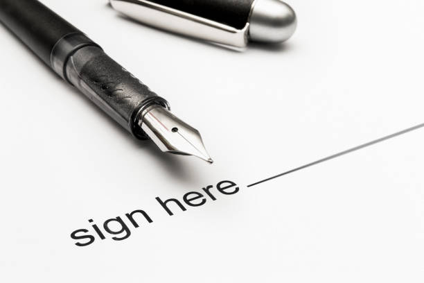 istock Close-up on the part to be signed of an administrative document 983309376