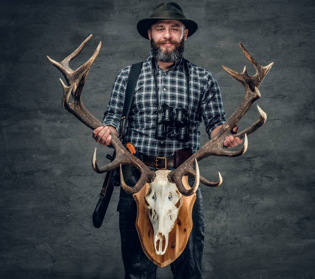 istock Portrait of hunter man 983316008