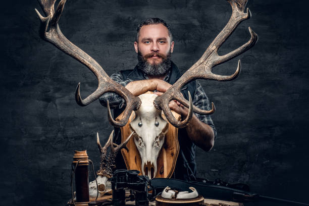 istock Portrait of hunter man 983316182