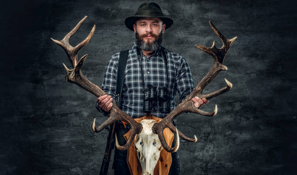 istock Portrait of hunter man 983321394