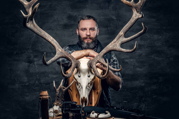 istock Portrait of hunter man 983321630