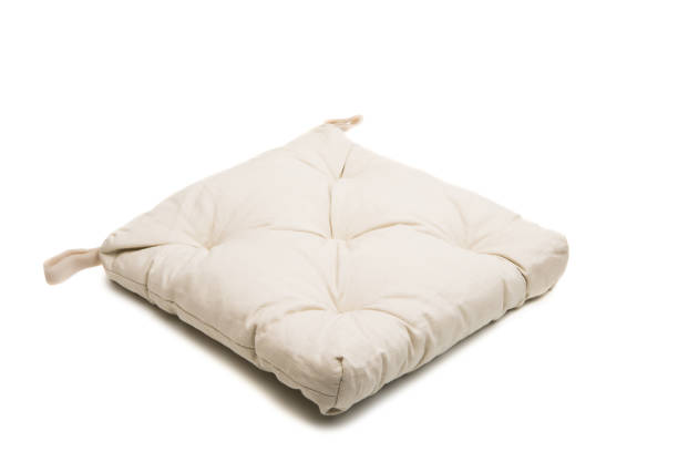 istock pillows on a chair isolated 983330758