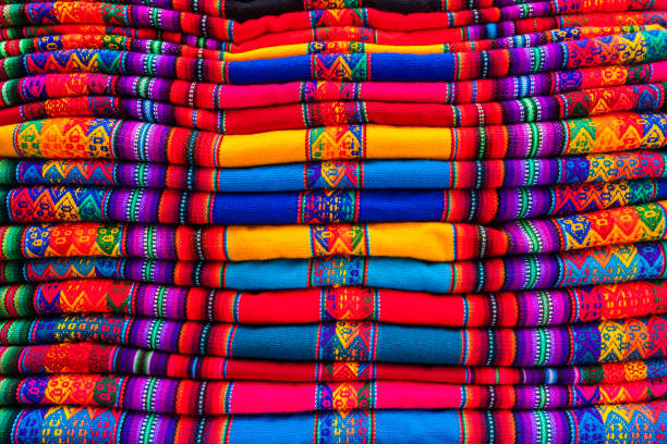 istock Colorful Peruvian fabrics for sale, Cuzco market, Peru 983336318