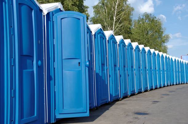 Portable toilets A line of portable toilets. portable toilet stock pictures, royalty-free photos & images