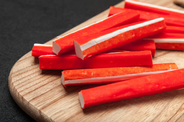 istock Asian surimi appetizer. Imitation crab stick. 983362520