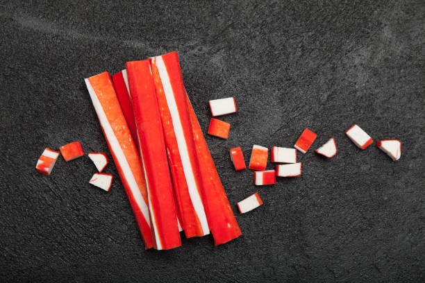 istock Asian surimi appetizer. Imitation crab stick. 983362678
