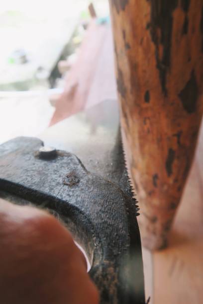 istock Man at work / housework stuff / sawing / painting / striking a nail with hammer 983363150