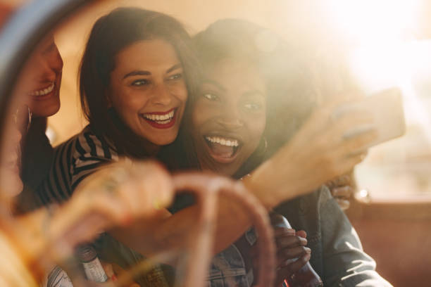 istock Friends taking selfie in the car 983366806