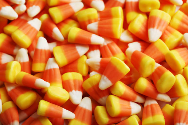 istock Halloween candy corns background, close up 983367804