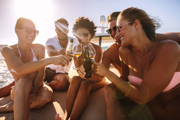istock Multi-ethnic friends partying on a boat 983370798