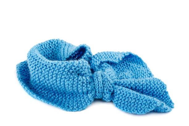 istock Blue knitted scarf isolated on white background 983371756