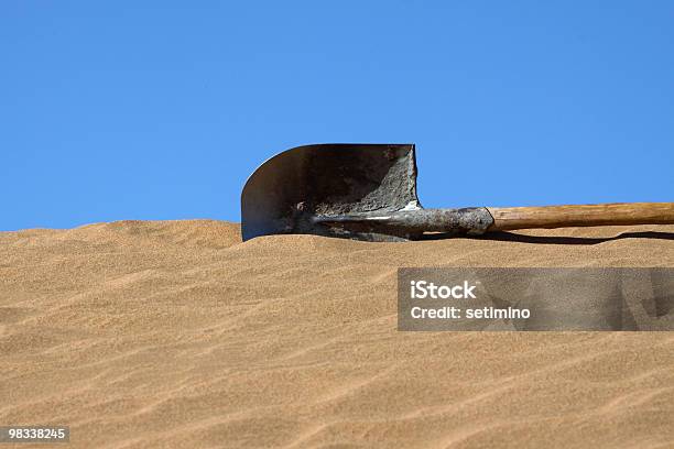Spade In Sand Stock Photo - Download Image Now - Lying Down, Shovel, Blue
