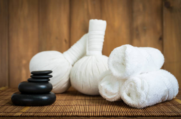 istock spa and massage objects on wooden background 983388814