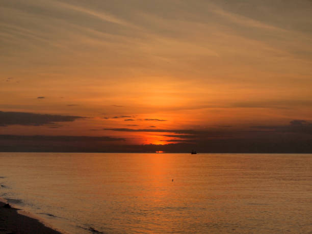 istock Slow shutter seascape view and beautiful sunrise 983388864