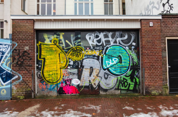 Amsterdam, Netherlands - December 13, 2017: Wall of graffiti in Amsterdam, Netherlands.