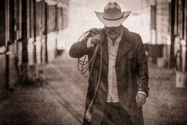 Men Holding Gun Wearing Hat Standing At Forest