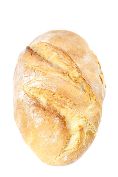 istock Loaf of wheat bread on white background. 983411256