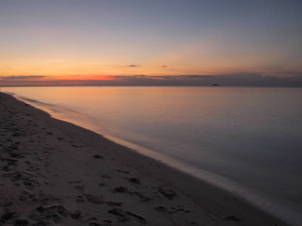 istock Slow shutter seascape view and beautiful sunrise 983411484