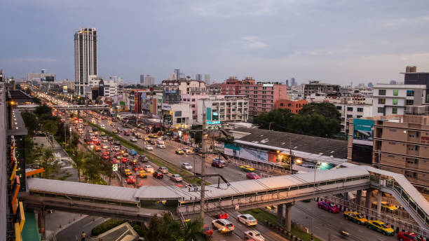 istock Cityscape and road at evening time 983417900