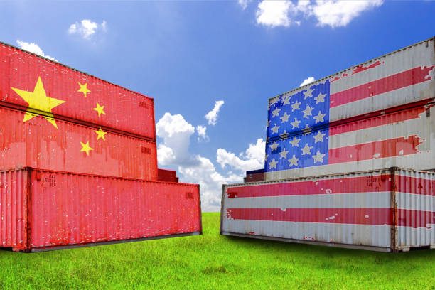istock Trade warfare, export and import, tariffs, cargo containers, China and the United States 983419148