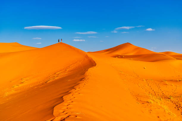 istock Tourists in the Sahara Desert - Morocco 983422030