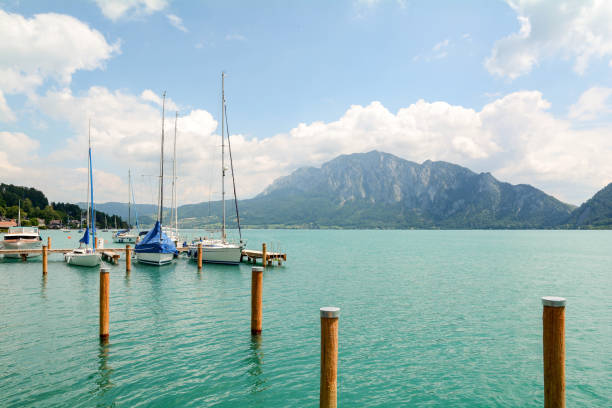 Jetty in Unterach at lake Attersee in austrian alps near Salzburg, Austria Europe Jetty in Unterach at lake Attersee in austrian alps near Salzburg, Austria Europe attersee stock pictures, royalty-free photos & images