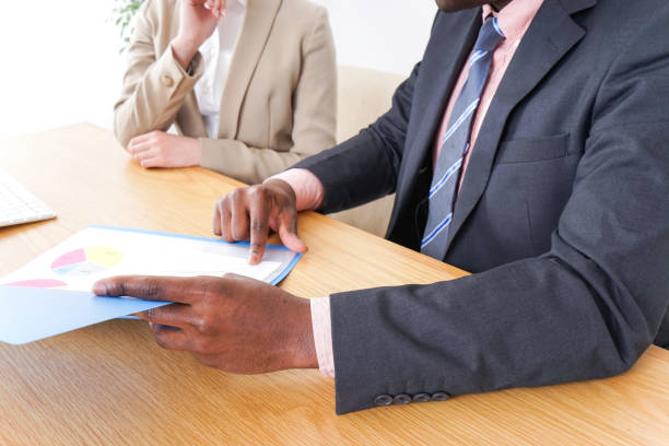 istock business persons in clean office 983457090