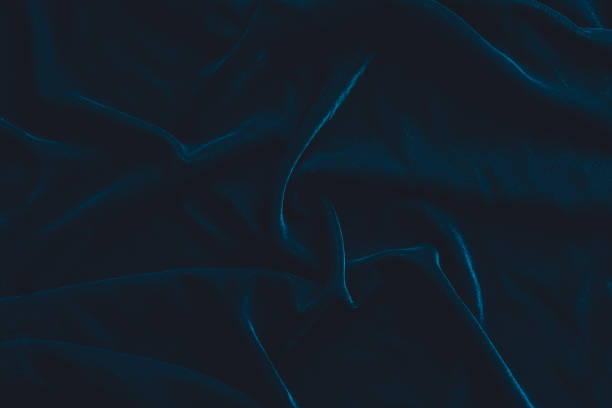 Luxurious dark blue velvet fabric background