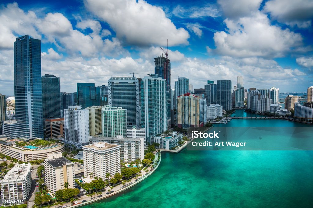 Downtown Miami Aerial The beautiful skyline of Miami, Florida shot during a helicopter photo flight about 500 feet over the Biscayne Bay. Miami Stock Photo