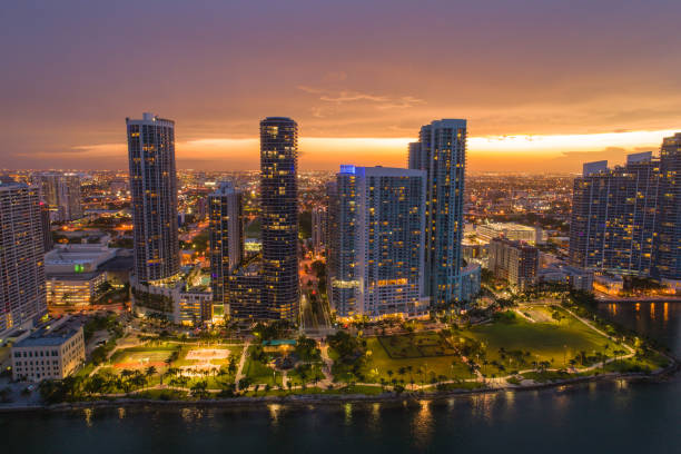 istock Aerial drone image Downtown Miami at sunset twilight 983502136