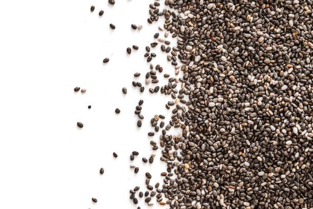 chia seeds isolated on white background. closeup. top view. chia superfood.  healthy eating  concept - biologic imagens e fotografias de stock