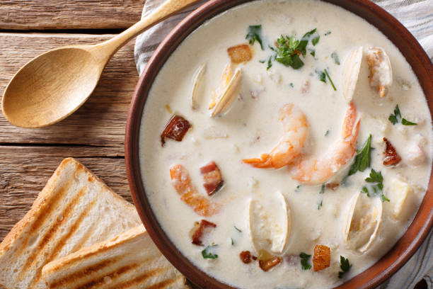 istock New England clam chowder soup close-up. horizontal top view 983503562