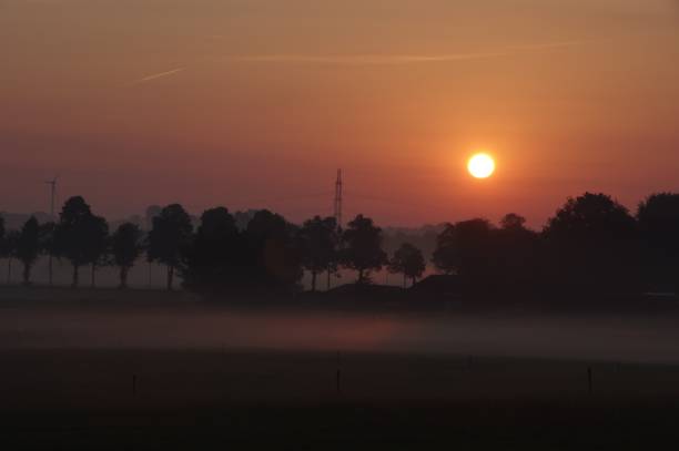 istock Misty sunrise over the country 983520560
