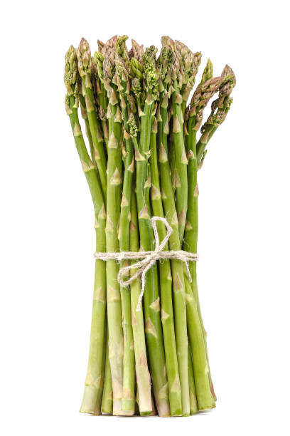 istock Fresh asparagus isolated on a white background 983537160