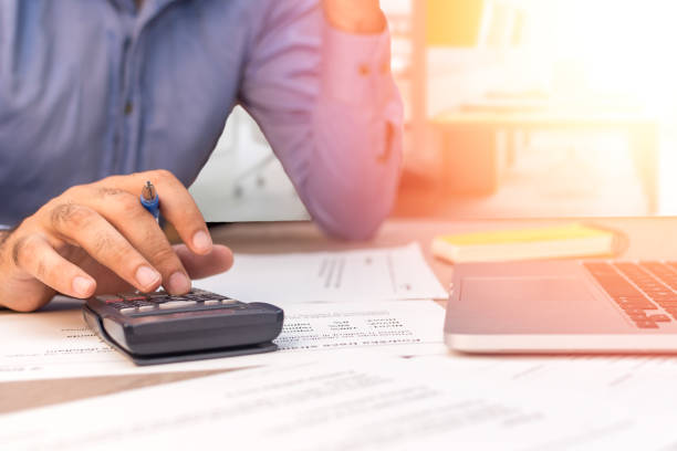 istock Businessman making some calculations 983547958