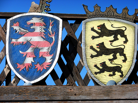 wooden coat of arms signs