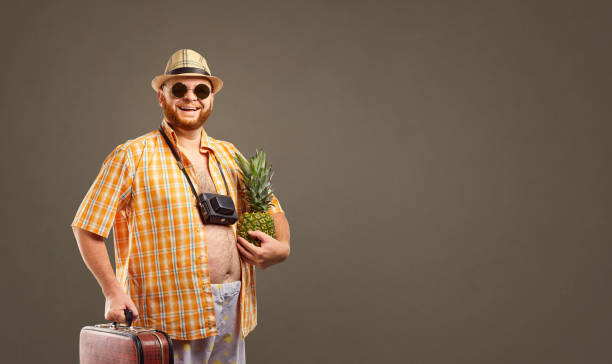 istock A funny overweight tourist   with  a bag smi 983601720
