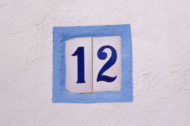 istock House number on ceramic tiles on white wall 983613714