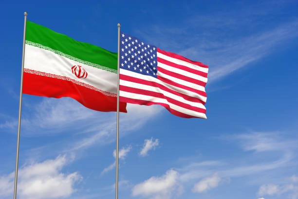 USA and Iran flags over blue sky background. 3D illustration stock photo