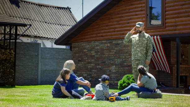 istock Military man with family in backyard 983637134