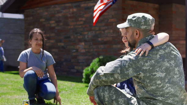 istock Military man spending time with family 983639268