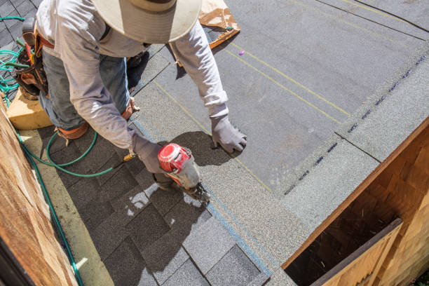 istock Installing new roof with nail gun 983645030