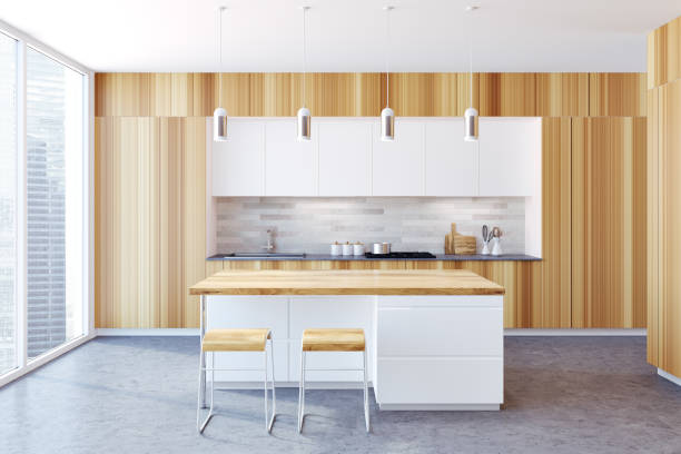 istock Wooden kitchen with a bar 983648240
