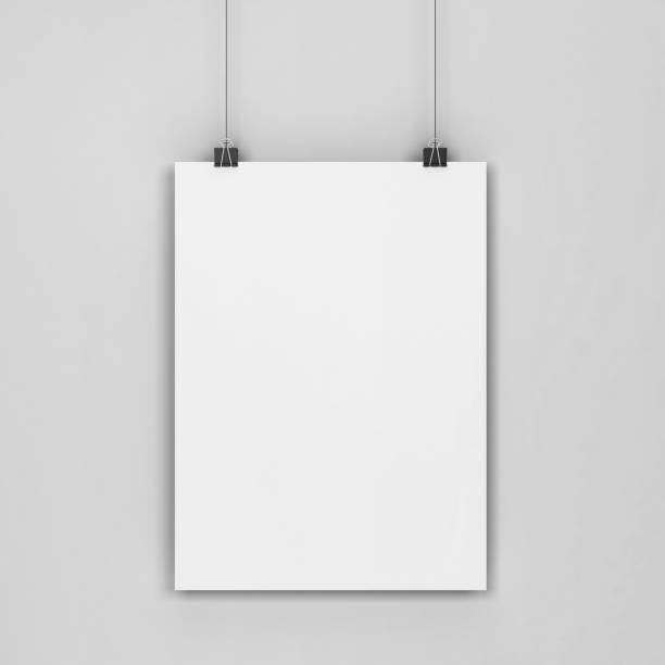 istock Blank poster hanging on a wall mockup 983648306