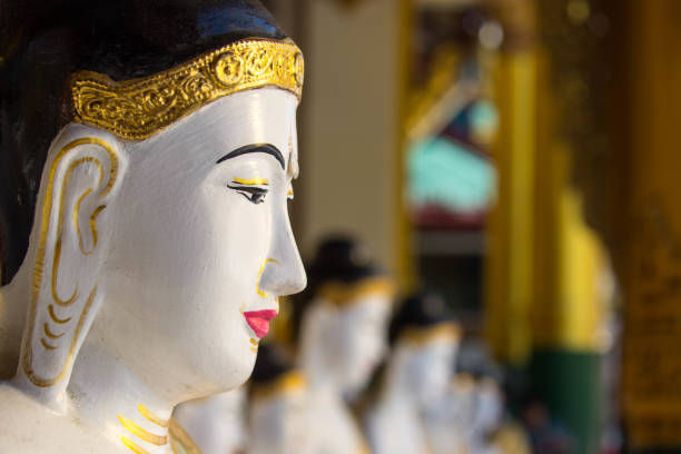A statue of Buddha at the Shwedagon Pagoda (aka Shwedagon Zedi Daw, Great Dagon Pagoda, or Golden Pagoda) in Yangon.