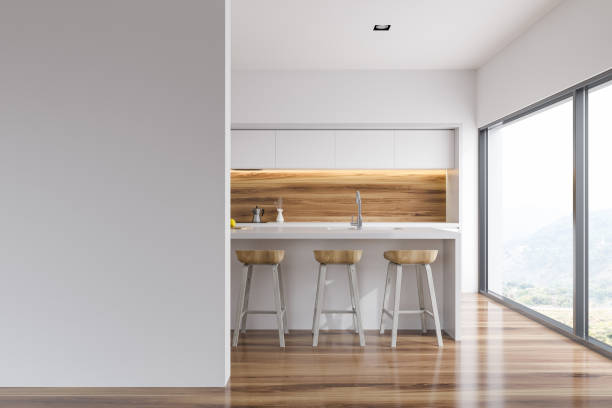 istock White and wood kitchen interior, bar blank wall 983651914